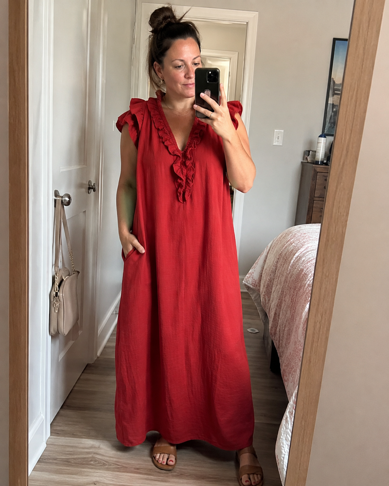 Customer photo: mirror selfie in the Rosalie dress in red, hand in the side pocket