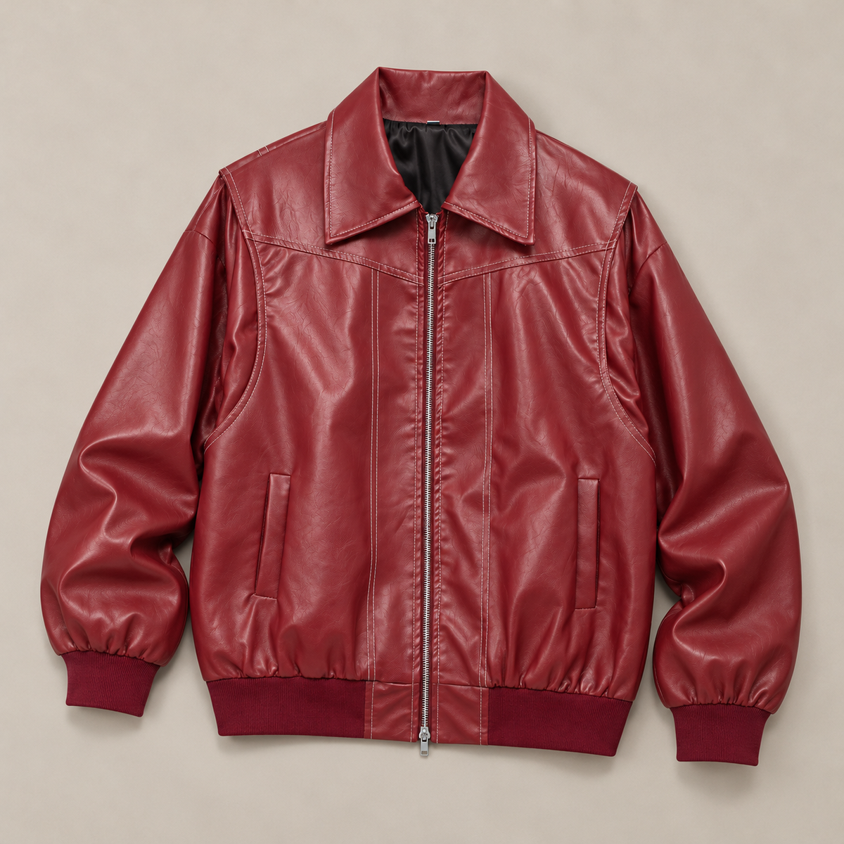 Jodie faux leather jacket – red, laid flat with the collar, zip and side pockets