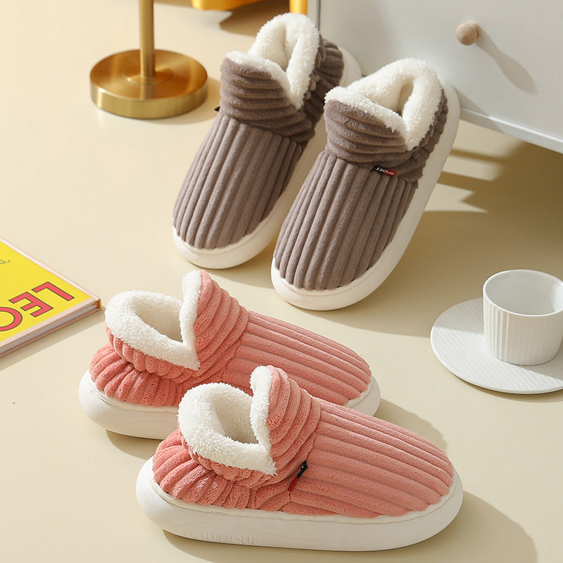Pluffy slippers in Brown and Pink on a light floor