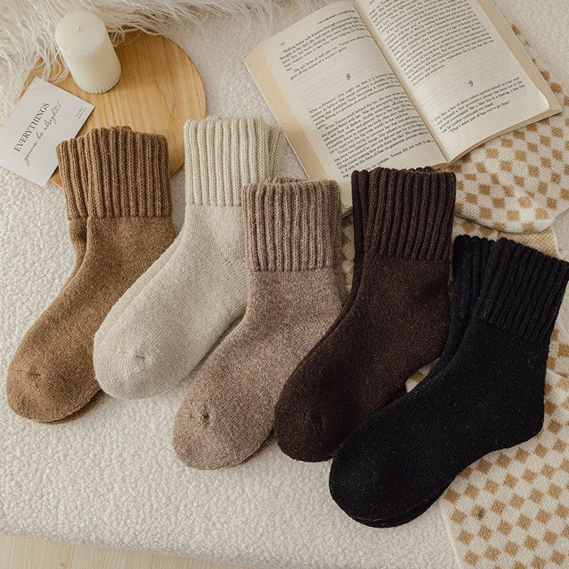 Maud knit socks in a row: camel, cream, taupe, chocolate and black