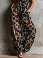 Orinda™ | Animal Print Deep V Halter Wide-Leg Jumpsuit