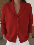 The same shawl-collar cardigan in red.