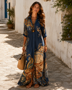 The same shirt dress on a deep navy ground, with the baroque border in gold and tan.