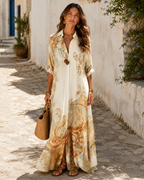 The same shirt dress on a cream ground, the baroque border printed in gold and apricot and running up from the hem.