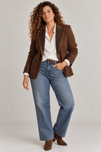 Full length, with wide-leg jeans and suede boots