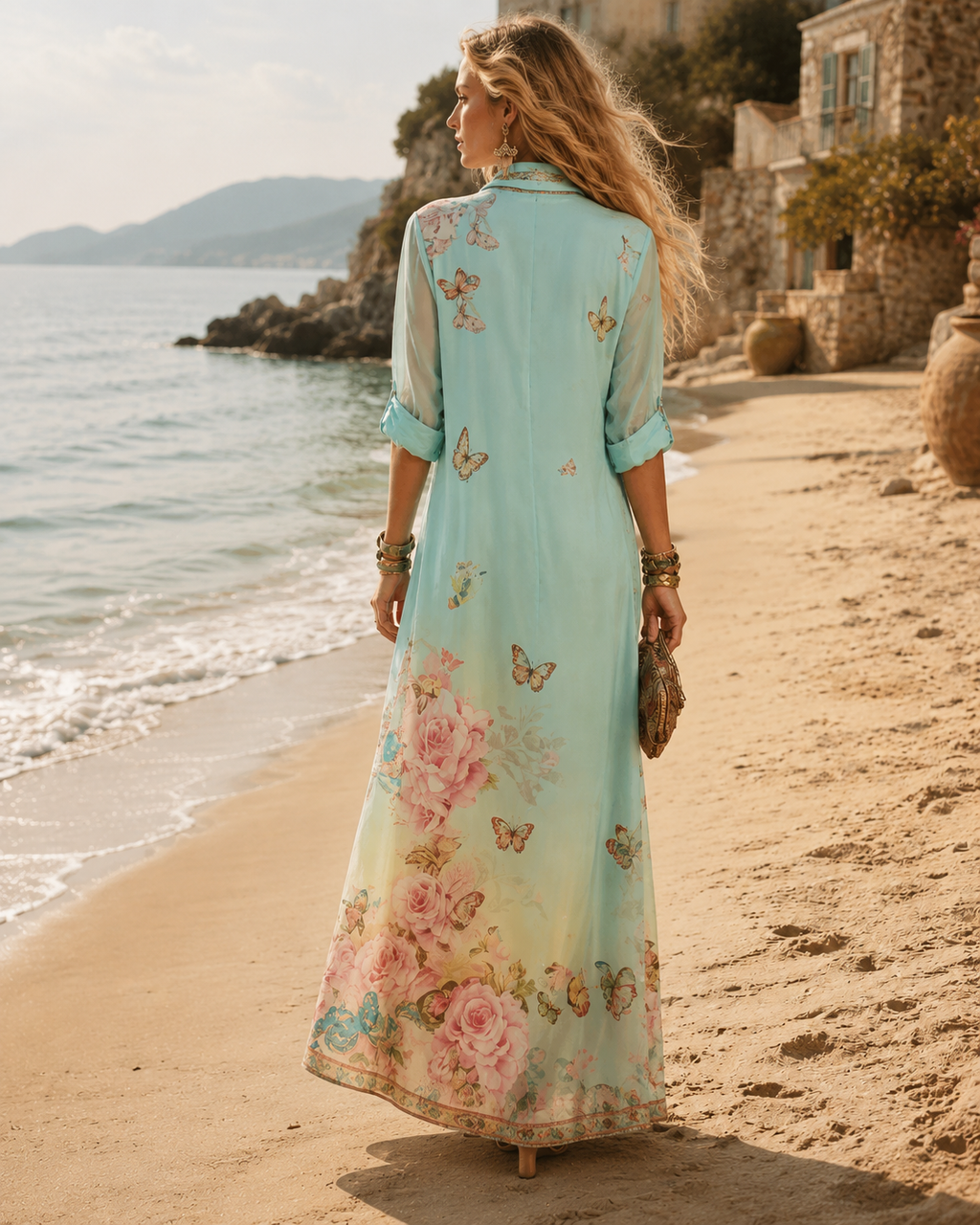 Back view of the Juliette shirt dress, showing butterflies scattered at the shoulder and the floral border at the hem