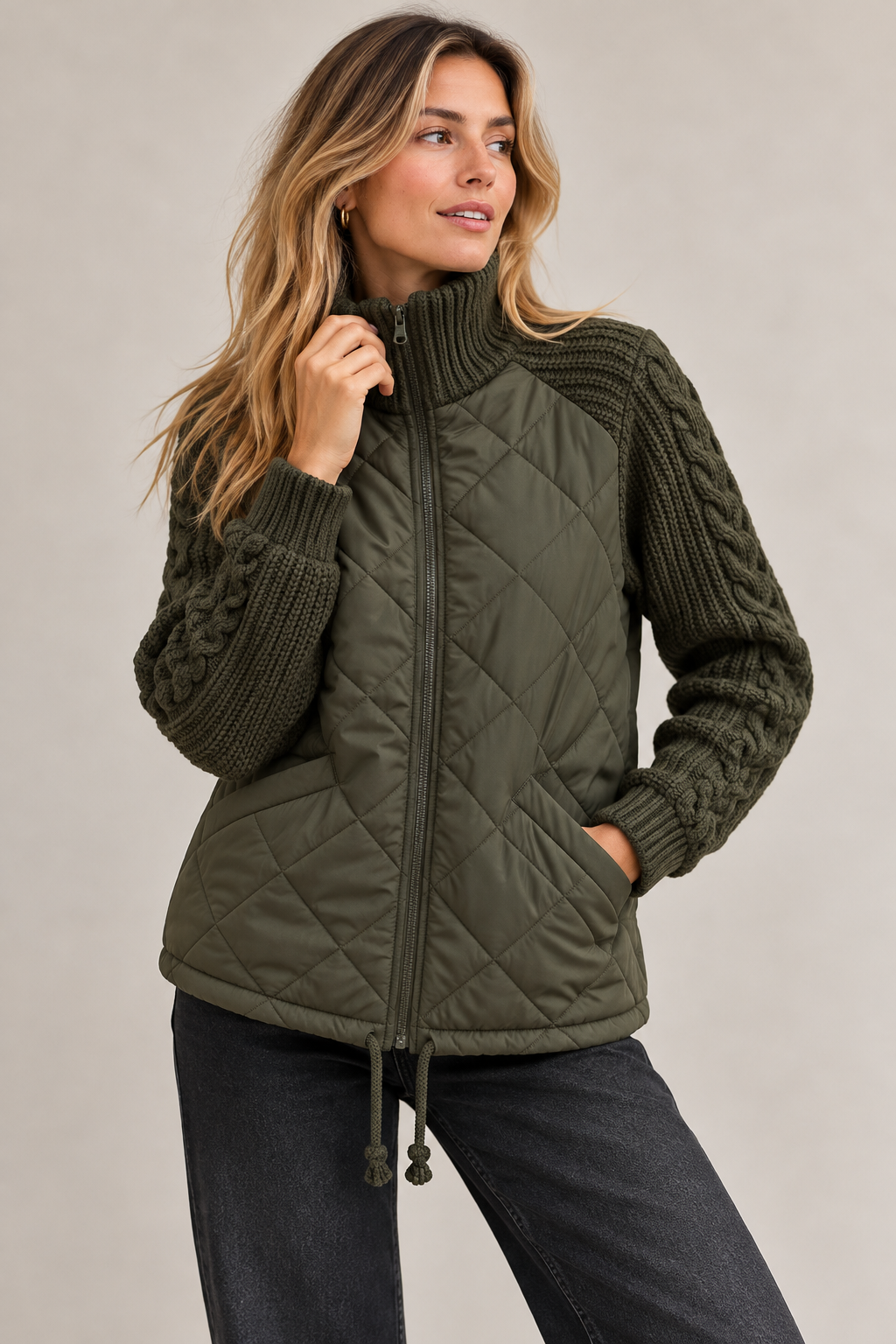Lena quilted jacket – army green, front view with cable-knit sleeves and drawstring hem