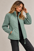 Lena quilted jacket – mint, worn open over a black top