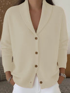 The same shawl-collar cardigan in oat.