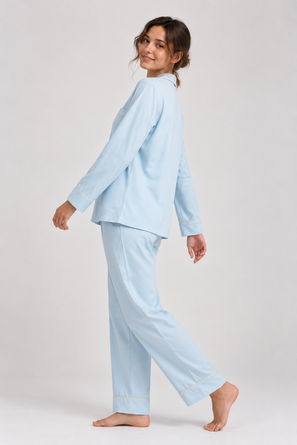 Side view of the Still Nights Modal Sleep Set in Powder Blue, walking